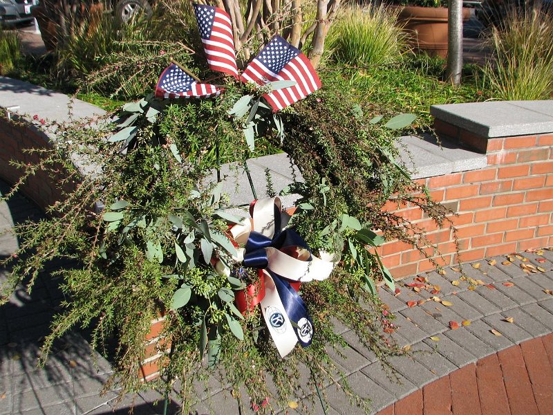 IMG_0065.JPG - Nancy Cressy, President of the Kiwanis Club of Potomac presented a natural wreath of evergreens, ribbons and flags.