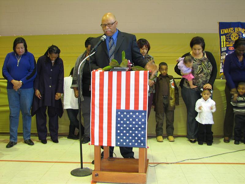 IMG_6036.JPG - Eric Sims presented the Prayer for the Children, with parents and children gathered around the speaker.  He spoke of the obligations and joys of parenthood.  He said we have the responsibility to live up to those obligations insuring children grow to take the same responsibilities on when they become parents.  It is the only way to become close to guaranteeing a civil society.