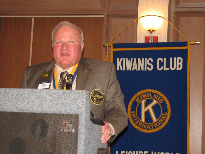 IMG_0314.JPG - Governor Tom Varner addresses the assembly with his ‘thank you’ and greetings from the Capital District.  Tom is from the Kiwanis Club of Ashton, Virginia, near Richmond.  District Governors make “official’ visits to each of the 21 divisions to meet with club officers and members, to bring his message, share other club’s successes and have a nice social evening for all.  This is a tradition for the 177 clubs in Maryland, Virginia, Delaware and the District of Columbia.