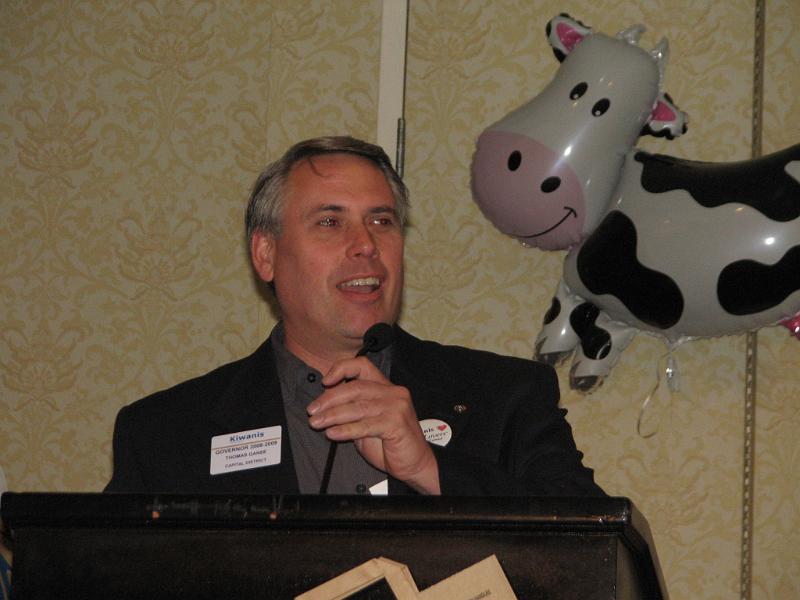 IMG_2458.JPG - Our Top ‘Cowanian’, Governor Tom Ganse gives moooving supportive from Capital District Kiwanis.
