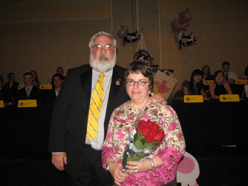IMG_2633.JPG - Joe presents Brenda Stankas a dozen red roses for all her leadership and support in organizing and doing the background support for the 60th Annual Key Club DCON.  It can’t be done without the Key Club advisor’s team.