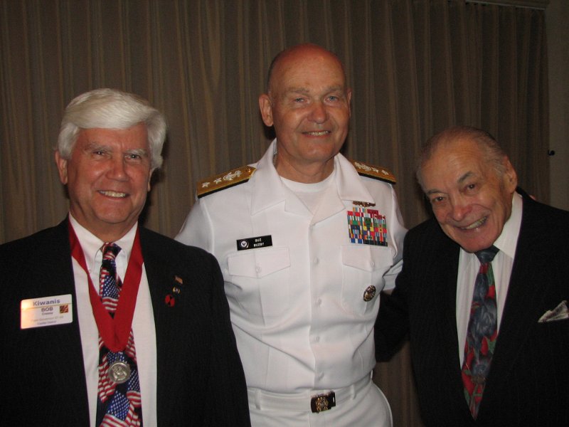 IMG_7783.JPG - Bob Cressy, Past Governor and veteran 1LT, U.S. Army Artillery and Bob Vigderhouse thank RADM Buzby for his address to the all attendees and especially for his interaction with the “Wounded Warriors” from Walter Reed.  They were delighted to be with him as well.  Bob Cressy recited the “Place for the Missing Man’ ritual during the program.