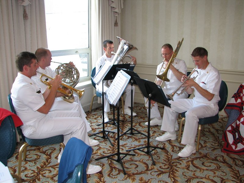 IMG_1645.JPG - The pre-dinner entertainment as well as for the opening ceremony of the ‘Presentation of the Colors’ was enthusiastically performed by none other than the United States Naval Academy Brass Quintet. They were in their crisp summer whites and they set the spirited tone for the evening.