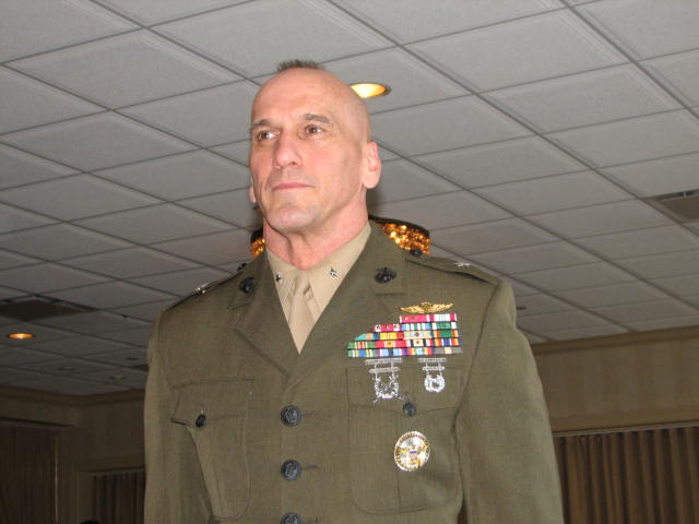 IMG_1672.JPG - Our Key Note Speaker, Brigadier General Richard L. Simcock II, United States Marine Corps, Principal Director (Asia Pacific), Office of the Deputy Under Secretary of Defense (Asia & Pacific), stationed at the Pentagon, Washington, DC, stood at rigid attention (as a six foot plus Marine General can do) while the Service Medleys were played and members & veterans of each branch stood and sang along for their service.