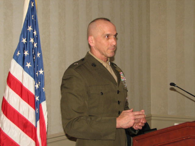 IMG_1683.JPG - After dinner, we all were honored to hear Key Note Brigadier General Simcock tell us of the extremely high caliber of today’s military forces. He spoke of the courage of the young men and women serving in Iraq and Afghanistan, many of who are 18, 19 and 20 years old, with a bravery and maturity equal to any time in this nation’s history. Ho spoke of the dangers in this world rife with terrorism threats and attacks. He said all branches of service toward are committed to meeting these threats even while being stretched throughout the globe. He spoke of how moved he is by our service personnel everyday.