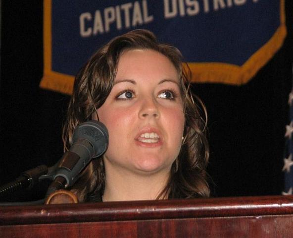 IMG_6399.JPG - CKI District Convention Chair Sarah Smith, LG Susquehanna Division and Past Key Club Governor, sends people off to sessions with the days announcements and messages.
