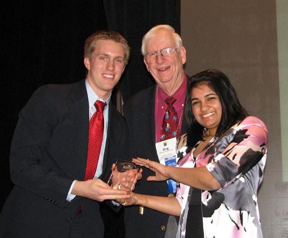 IMG_6436.JPG - The award of the Lindley “Dig” DeGarmo CKI Distinguished CKI Club Vice President goes to Ryan White of Virginia Commonwealth University.  Past Kiwanis International Trustee Dig and Governor Avanti made the presentation.  Congratulations!