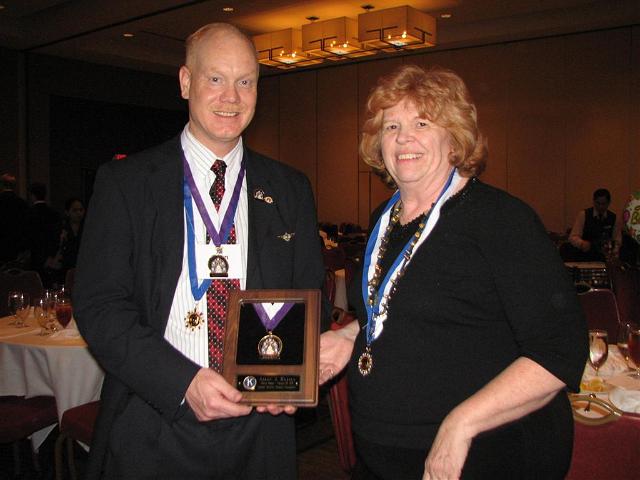 IMG_6527.JPG - Capital District Kiwanis Foundation – Founder’s Society –  A Foundation is an important part of our Kiwanis organization so that we can accept charitable donations, from people like you and organizations, and make tax free donations as a Foundation to such organizations as our SLP units and the seven pediatric hospitals.  One way is through the Founder’s Society award for dedicated service to Kiwanis.  Spearheaded by LG Rosemary Cummings Division 11 clubs have given a Founder’s award to Distinguished Lieutenant Governor Allan Kujala.  Allan was very surprised and moved by your appreciation.  Thank you!