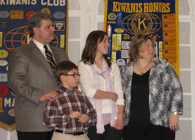 IMG_6330.JPG - Paul is really a family man.  First, as you can see he has brought his family on the visit.  Here they wait to see if President Lloyd Morrison is going to give them the keys to a new car after Paul’s address.
