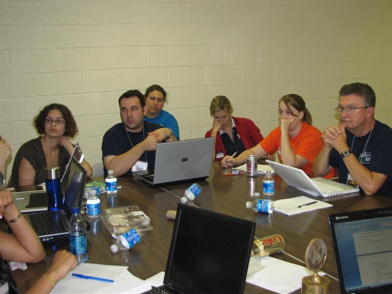 IMG_0455.JPG - Thoughtful discussion takes place, as you can see.  Zone Administrator Tom French is in the PC zone discussion.