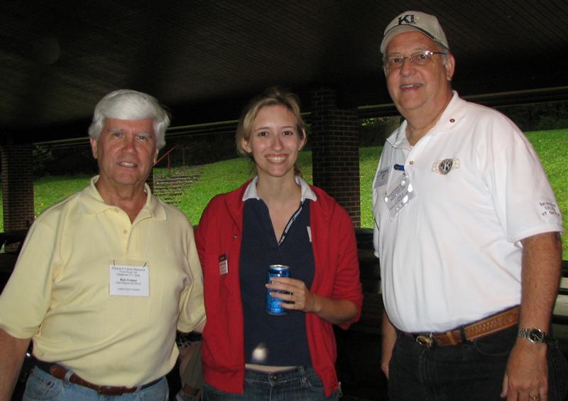IMG_0457.JPG - Next, after the Board meetings, it’s back to the Saturday night steak & chicken cookout.  IPG Bob Cressy, Community Service Chair Jen Dugent and Kiwanis Governor Art Riley are ready to go … eat.