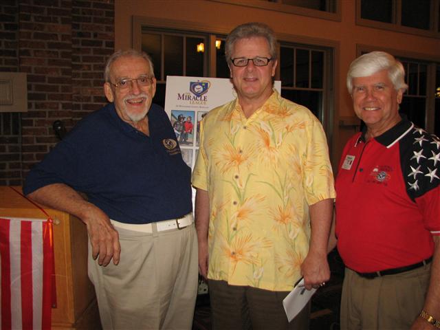 IMG_9283.JPG - In the wrap up three of the club’s past presidents met at the podium:  Jim Leder, Jim Aylor and Bob Cressy.  It was a fun day with good friends.  P.S. That shirt of Bob’s is the new CapDist Official Golf Shirt … an attention getter.  Of course you can still wear the older style you have, but the new one is real nice.