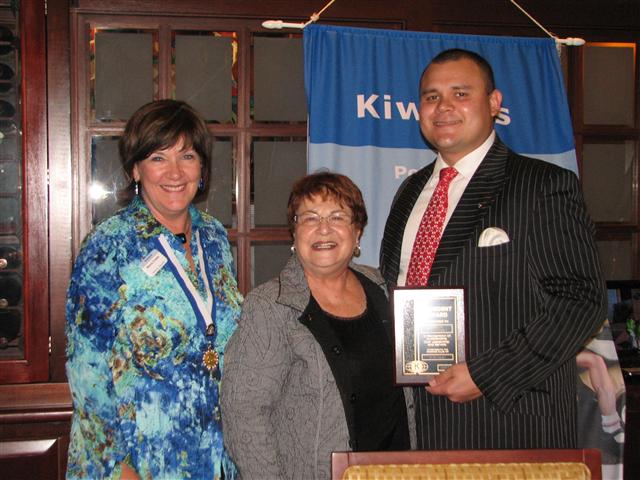 IMG_9308.JPG - Potomac’s President for 2010-2011 is Nancy Cressy. She was installed by Division 17’s new Lieutenant Governor, Joyce Sharon, a member of the Wheaton-Silver Spring Club.  Now Immediate Past President Aaron Ferrufino proudly receives his Past President Award for Outstanding Leadership of the Potomac, Maryland Club.