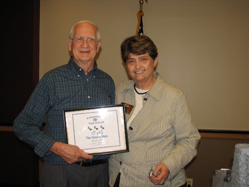 IMG_5387.JPG - Walt Petzold, President Elect 2011-2012 and Current President Helen Williams the leader of the Wheaton-Silver Spring Kiwanis Club presents the “Unsung Hero” award to Walt.  This award is given to a member of each Kiwanis Club who continually ‘steps forward’ and accepts responsibility to over see or participate in all service projects, serve on various committees and is a positive force within the Club.  We all know of Walt’s Kiwanis dedication over the years.  Thanks, Walt !
