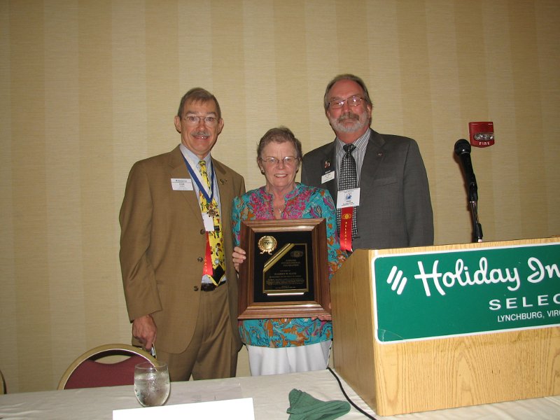 IMG_1898.JPG - Past Gov. Warren Kane was presented posthumously with memmership in the Kiwanis International Foundation. Accepting was his wife, Dale Kane. (L to R) Gov. Don Dudey, Dale Kane, KI Trustee Dr. David Button.