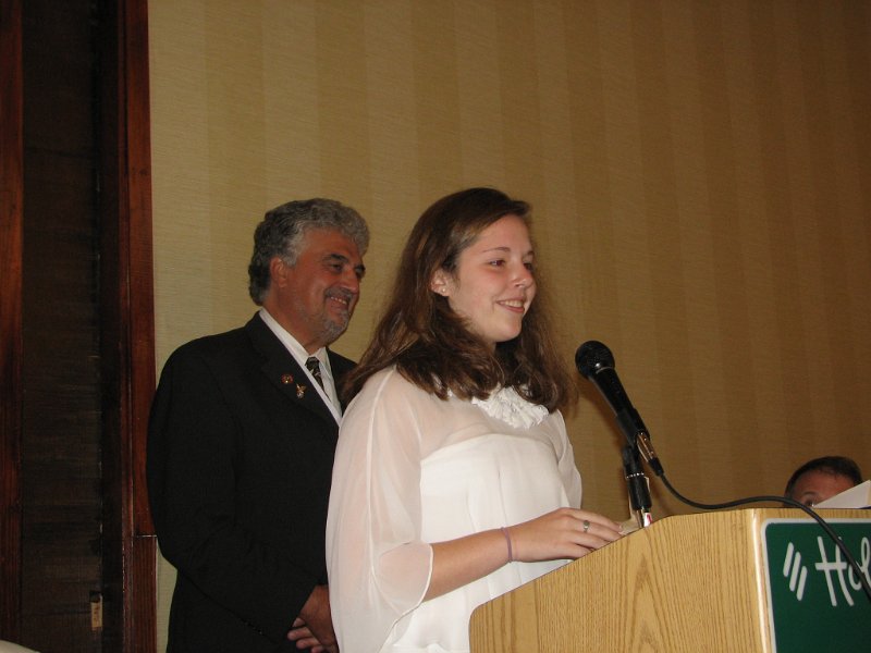 IMG_1955.JPG - Roger Diehl looks on as Teenager of the Year Nicole Muller addresses the Convention.