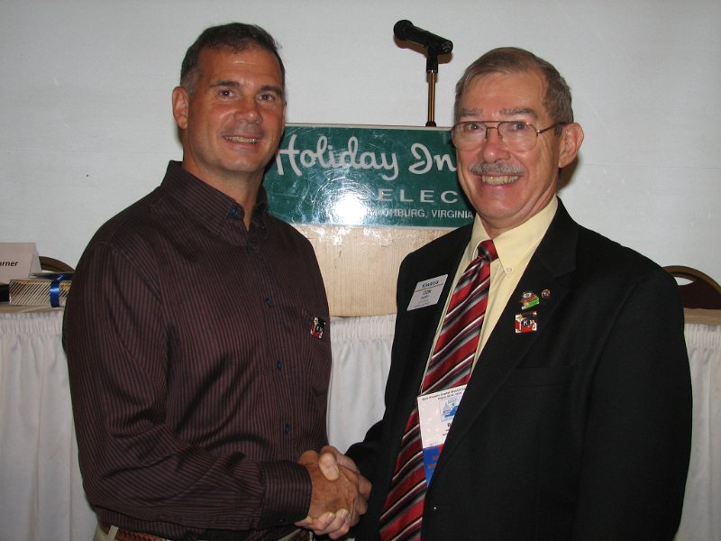 IMG_2047.JPG - Gov. Don Dudey (right) congratulates Lynchburg Kiwanian and 2010 District Convention Chairman, David Heppner, on having a successful convention.