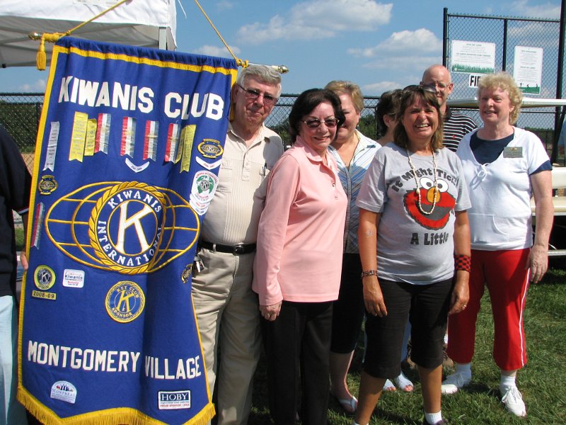 IMG_8908.JPG - Montgomery Village Kiwanis Club supports “The Miracle”.  Shown are PLG Dave Benway and PP Carla Benway, PLG Bill Stabler, a ball player and two not clearly visible (sorry).