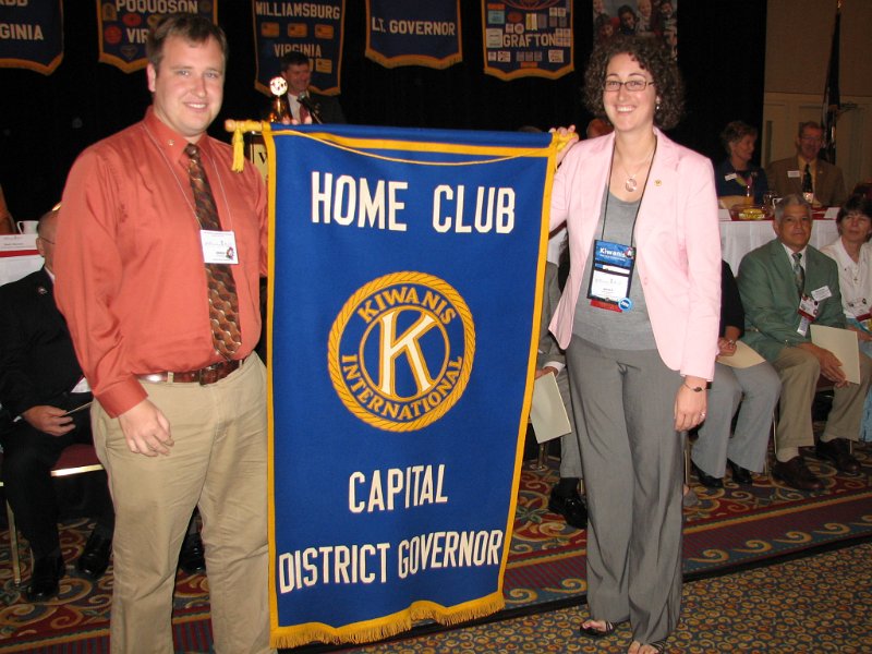 172.JPG - The Capital District “Home of the District Governor” banner is transferred from the Ashton, Virginia Kiwanis Club to the Kiwanis Club of Tysons Corners/McLean, Virginia. The 93rd Annual Capital District Kiwanis Convention is adjourned. Ding!