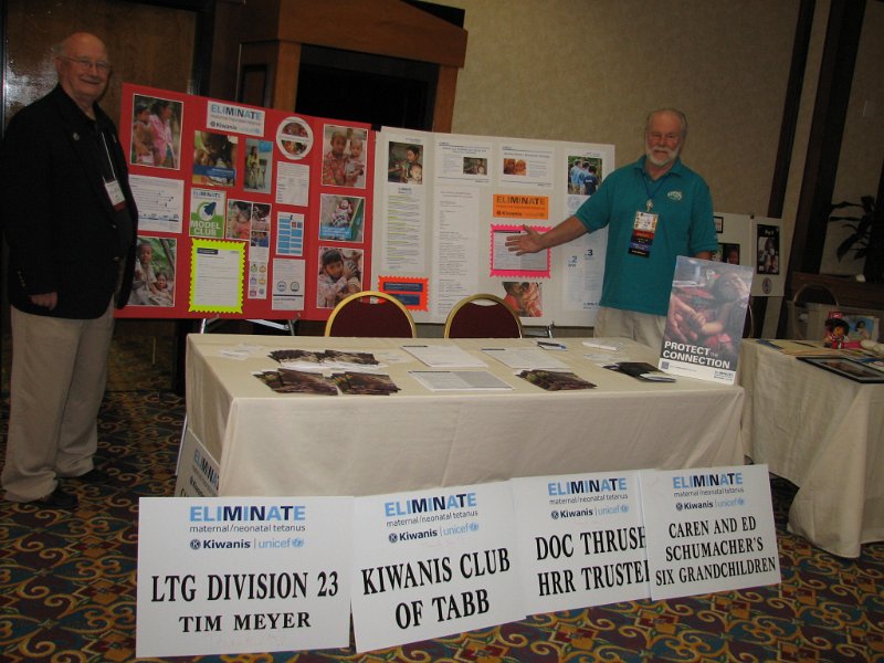 IMG_5060b.JPG - Hugh Siggins and John Tyner show off Capital District Foundation's table promoting The Eliminate Project.