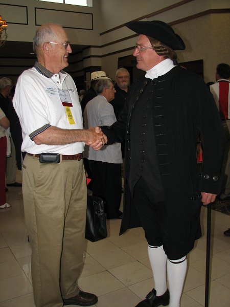 IMG_5088a.JPG - Joe Copenhaver greets Patrick Henry (Richard Schumann) before having breakfast Saturday morning.