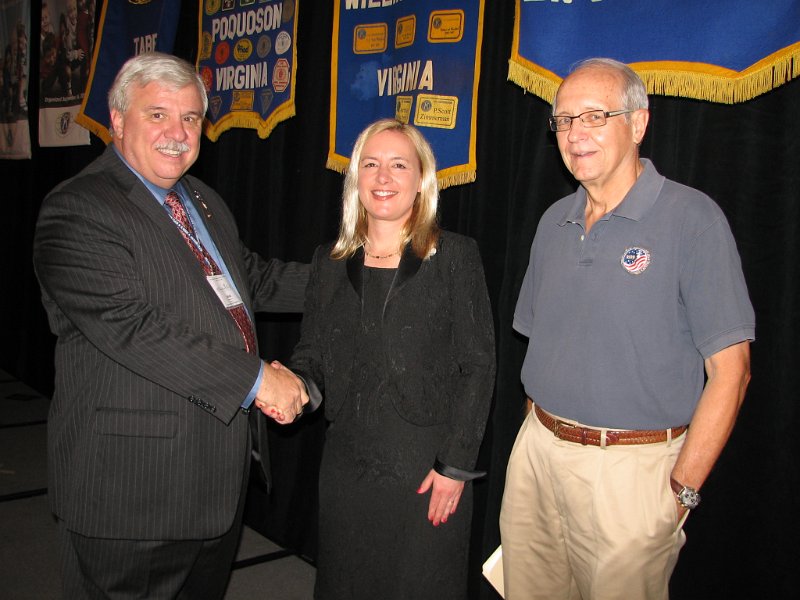 IMG_5127a.JPG - Williamsburg Club Pres. Wade Quinn greets Mary Jones, Chair, James City County Board of Subervisors and Clyd Haulman, Mayor, City of Williamsburg.