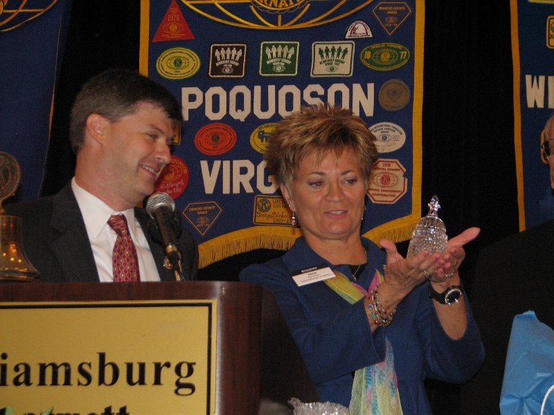 IMG_5328.JPG - Governor Designate Jeff Wolff presents a very nice gift of appreciation to KI Trustee Jane Erickson. It’s a Waterford crystal United States Capital Dome.